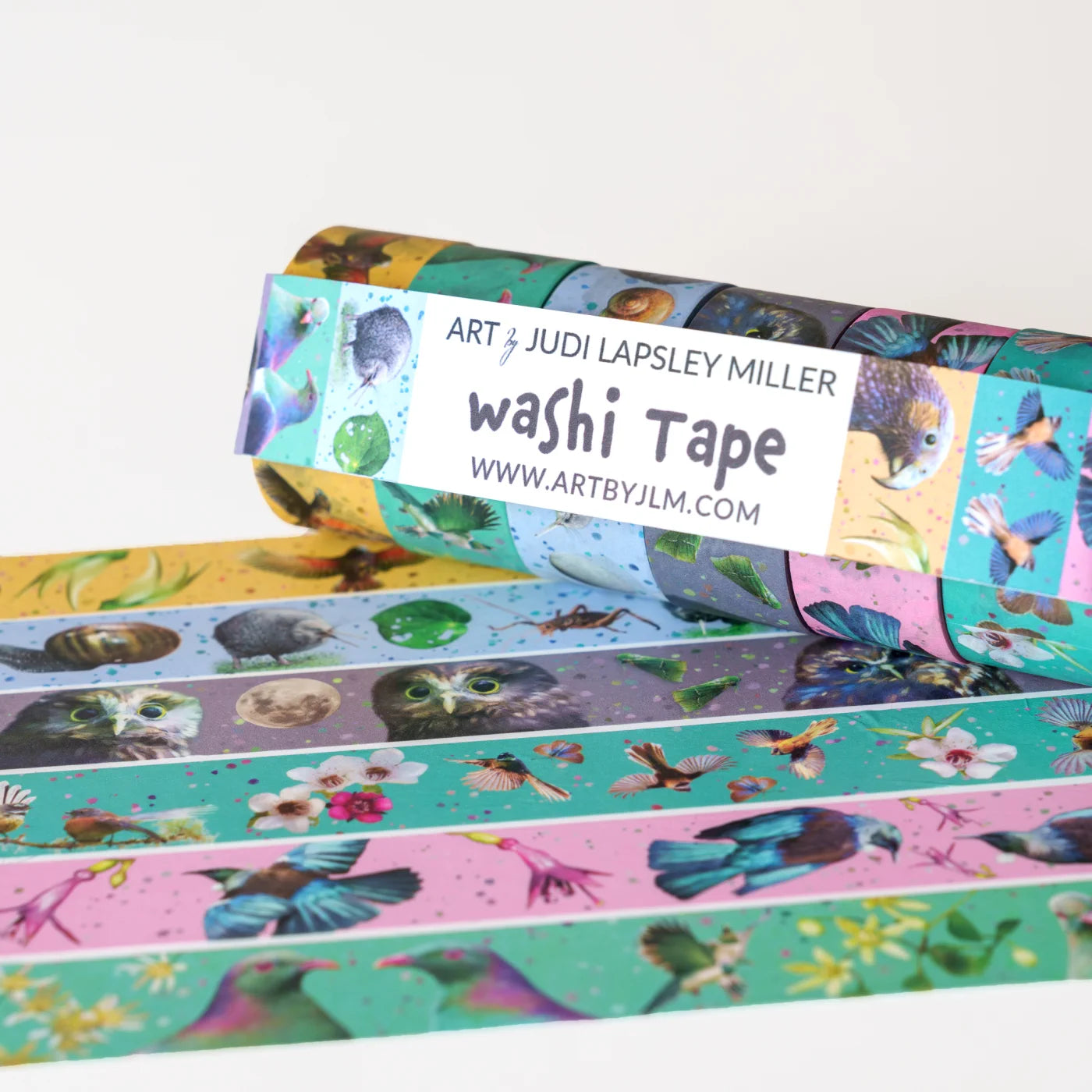 Rolls of colorful washi tape with bird designs