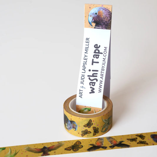 Roll of washi tape with a colorful parrot and butterfly design on a ginger spice background