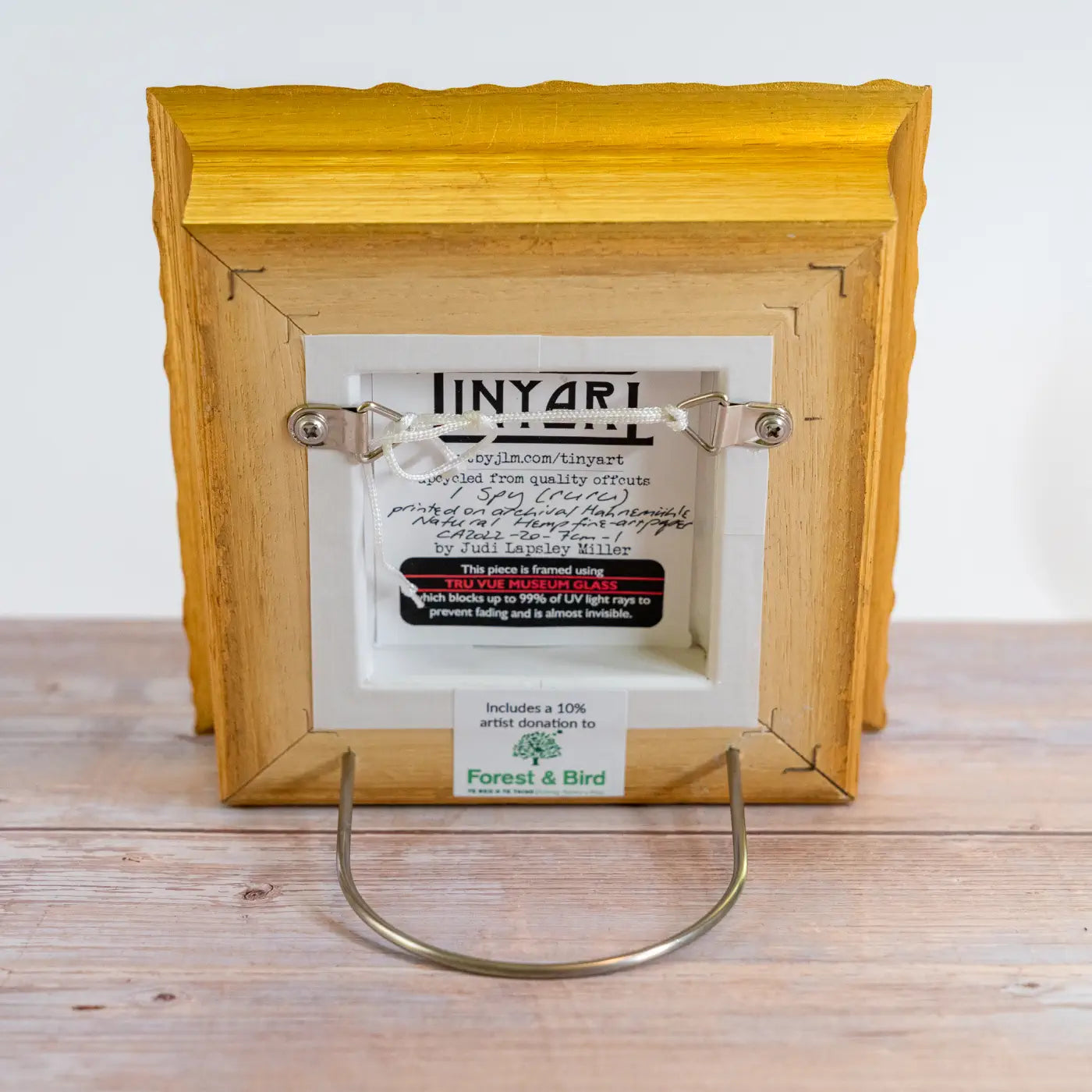 Back view of TinyArt with U-stand