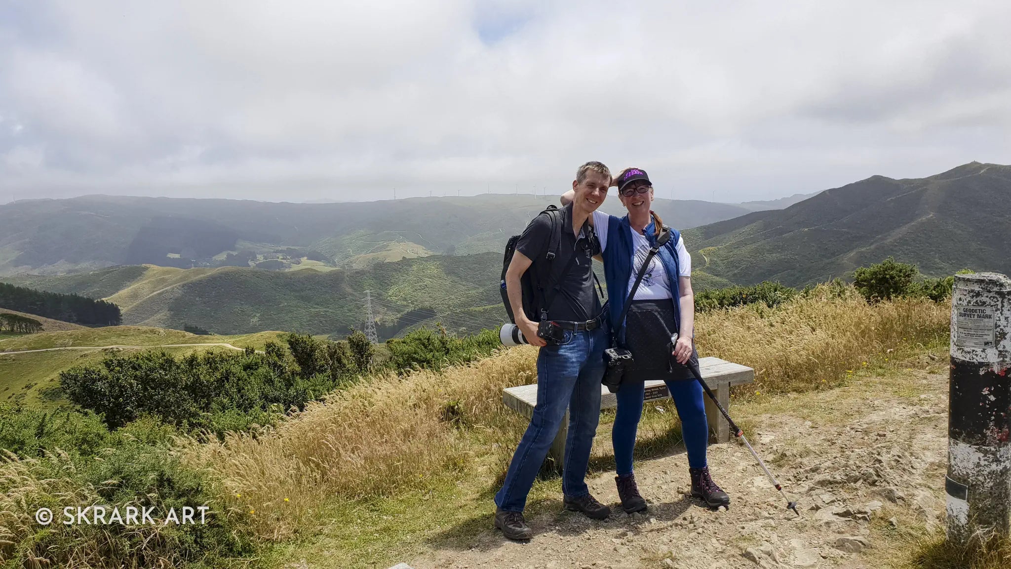 Linton and Judi on  top of a hill with cameras, photo by Hannah Shand