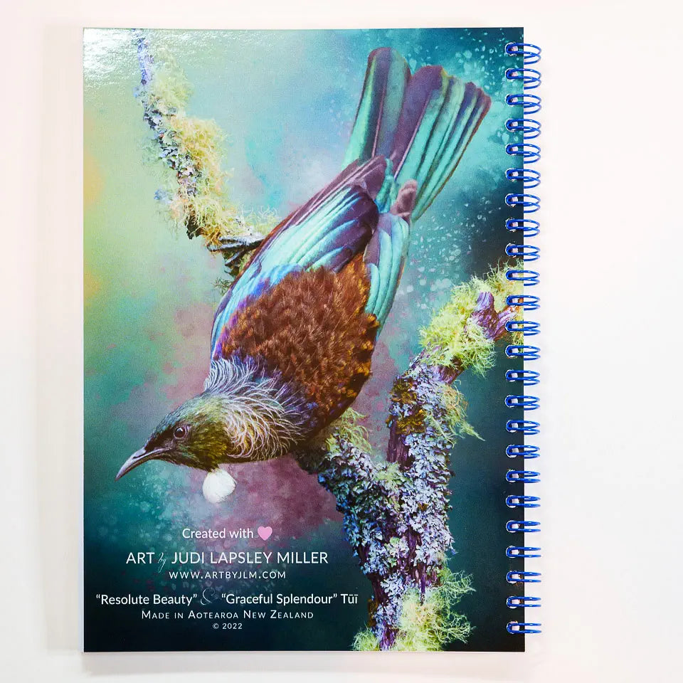 back cover of note books with a tui artwork