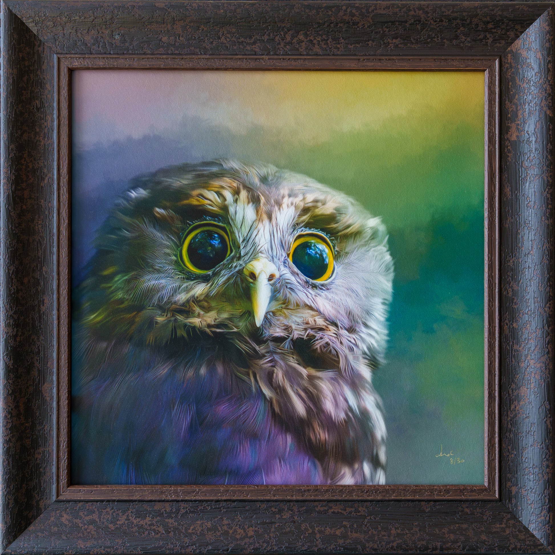 A framed square painting of a close-up owl portrait with large yellow eyes and a soft multicolor background, set in a dark brown textured frame.