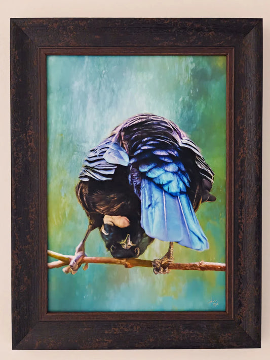 quirky tui art in a rustic frame