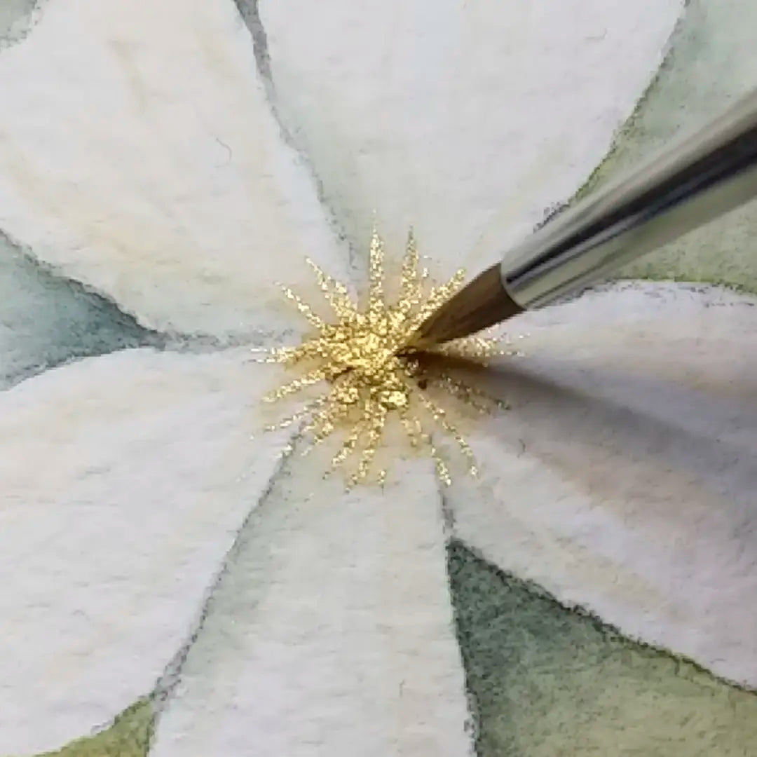 Adding gold watercolour paint accents to a watercolour painting of a flower