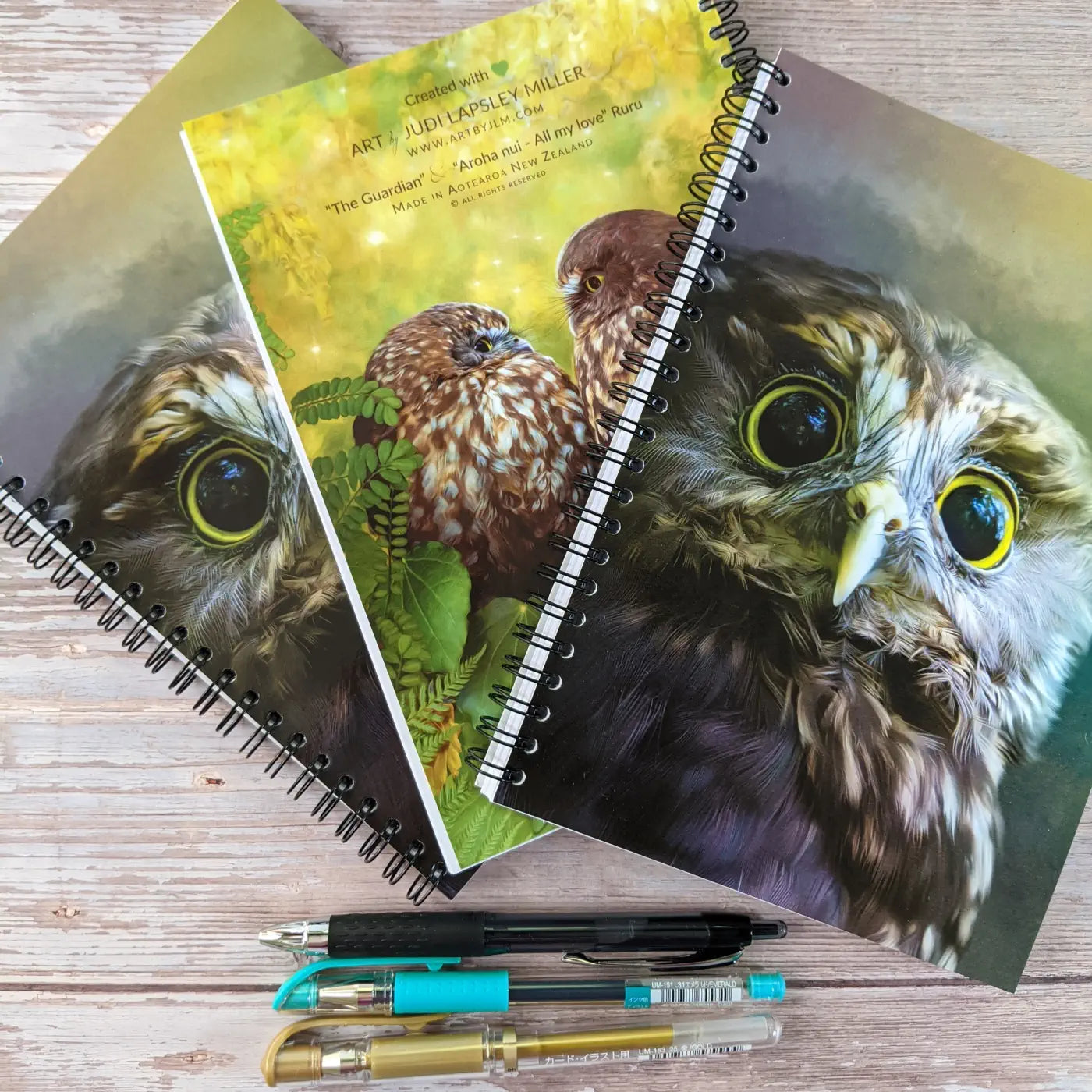 3 notebooks with owls and 3 pens