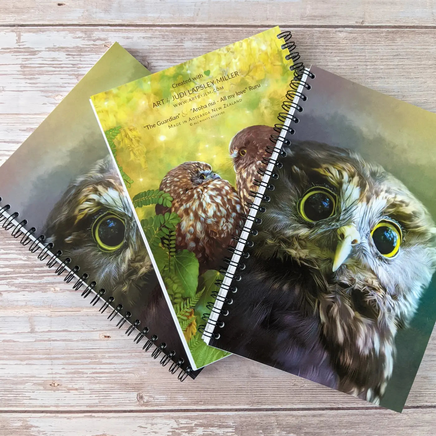 3 notebooks with owls