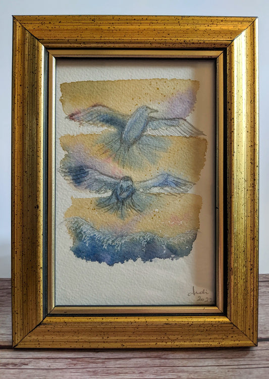 gold framed seagull painting