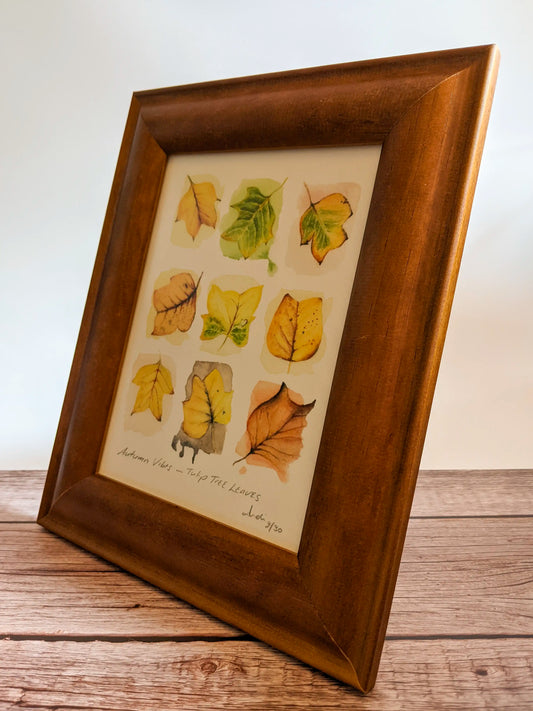angled view of framed painting of leaves
