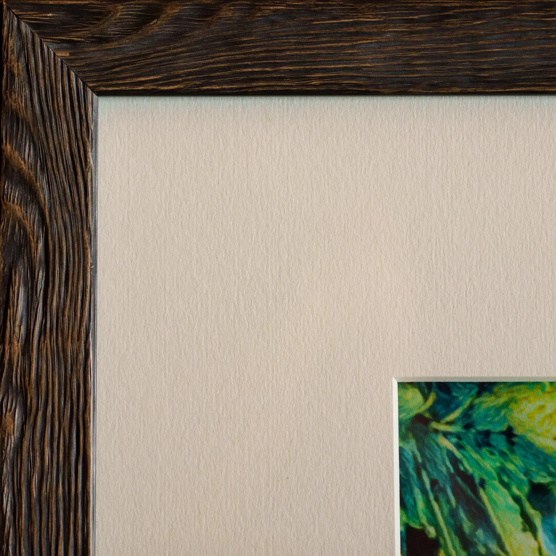 Close-up of the textured wooden frame and matboard