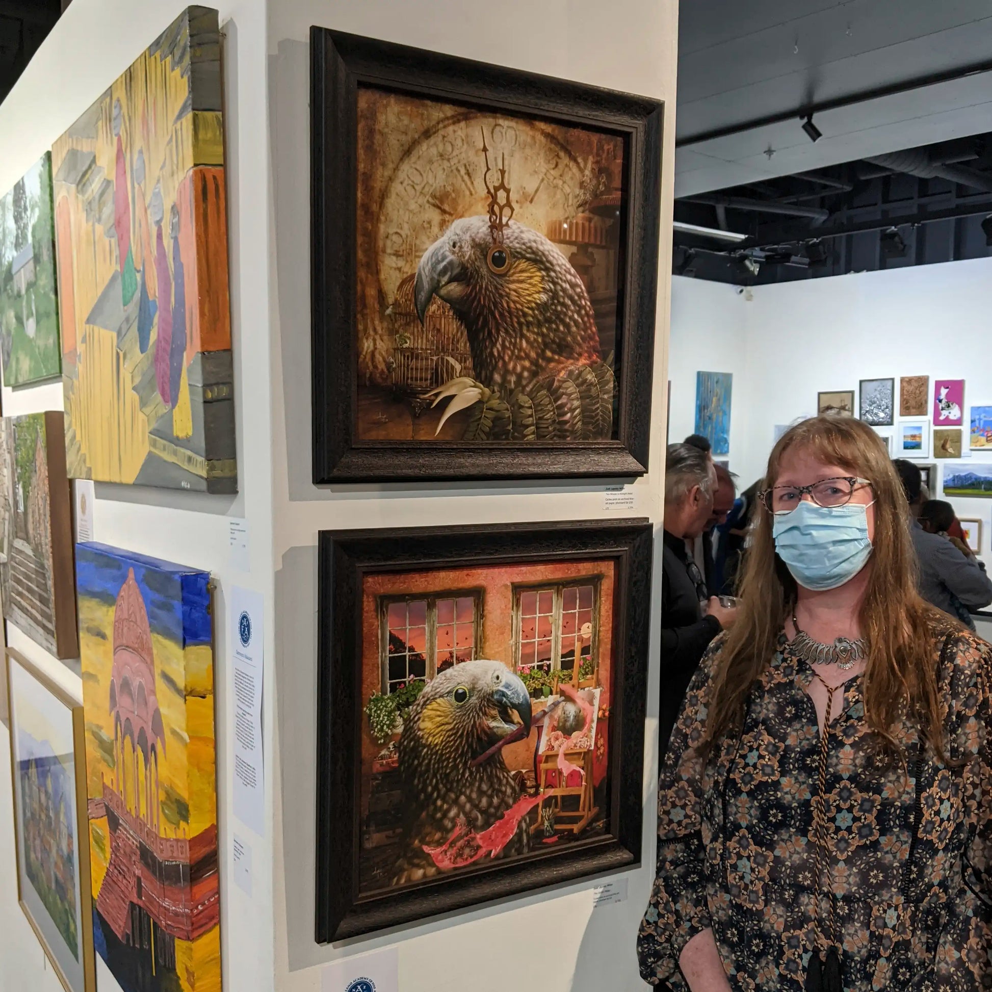 Judi with two of her artworks at the NZAFA