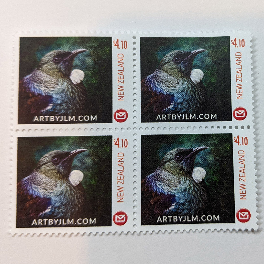 Official personalized postage stamp issued by New Zealand post of a tui in profile - block of four stamps